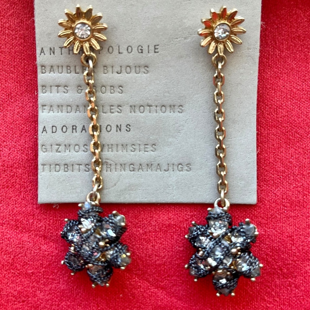 Long gold tone flower earrings with grey and clear crystals